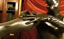 Girl in latex mask on webcam