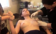 Young Girl gets Nipples Pierced