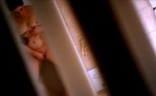 Sexy black amateur caught taking a shower on hidden cam