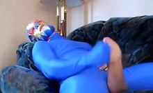 dude in mask a blue zentia suit strokes his big cock