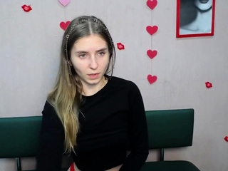 Young Ukrainian blonde in red panties posing on webcam show