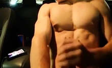 Big-Cocked Man Strokes in Car While Watching Porn