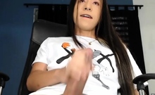 Young Tranny Shows Off Her Big Cock in an Explosive StripTan