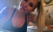 Blonde teen in solo action with her pussy