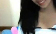 Skinny Indonesian Teen Shows Off Her Tits on Webcam