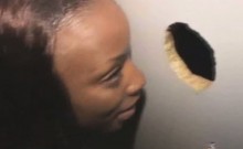 Black Ghetto Slut Sucking Dick Through A Glory Hole